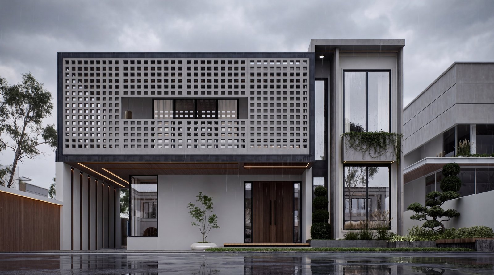 A two-storey modern house with a perforated brick screen and timber entrance at dusk.