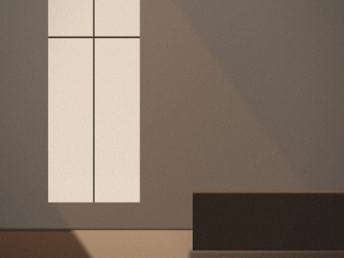 Placeholder image: a warm, softly lit room with a shaft of light falling from a tall window